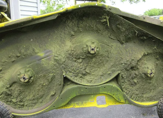 Clean debris from the mower deck to extend belt life.